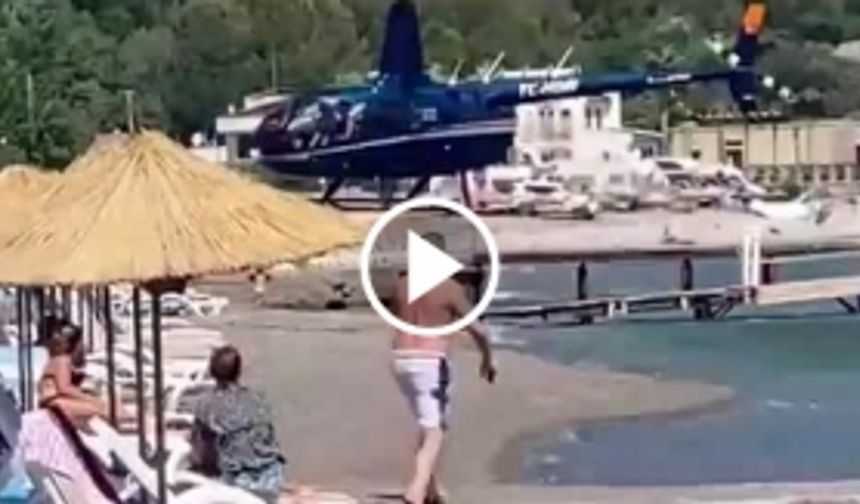 Helikopter yemek için halk plajına indi!